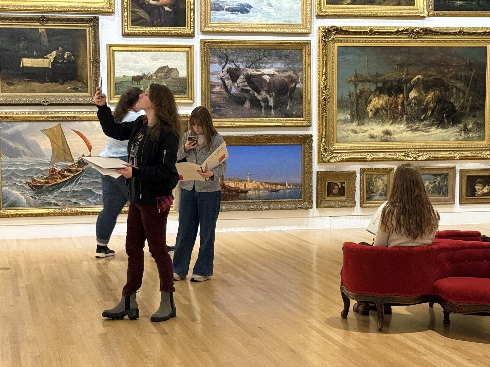 Students in a painting gallery while on a field trip to the Seattle Art Museum in 2024